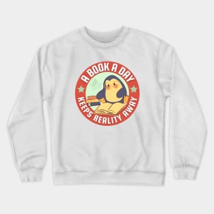 A book a day keeps reality away - cute penguin reading book Crewneck Sweatshirt